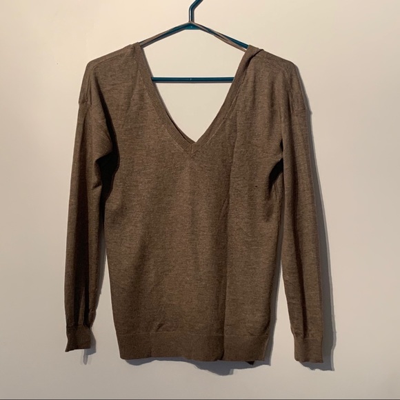 Brown V-neck sweater. - Picture 1 of 3
